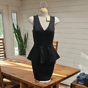 Elegant Black Peplum Dress Body Contouring. Sz Med Nwt. Rolla Coaster Mfg